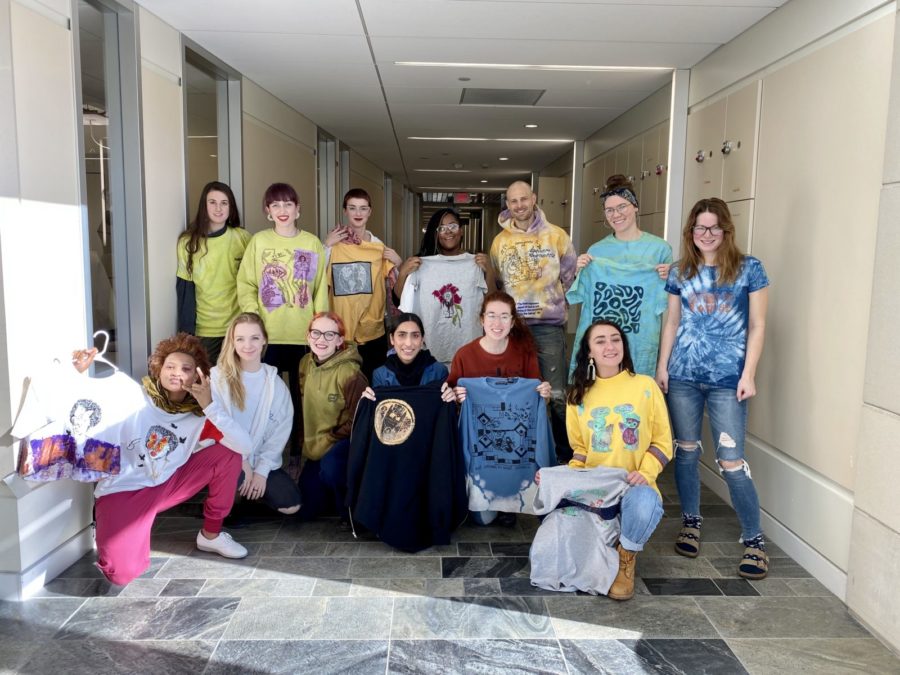 Students show off the garments they designed in Professor Angus's Printing & Dyeing class, with Rob Bowhan.
