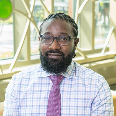 Professional headshot of Alvin Thomas at Nancy Nicholas Hall.
