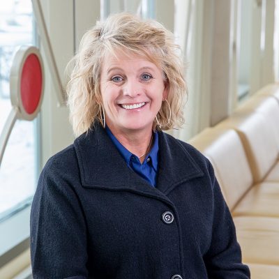 A professional Headshot of Deb Olson.