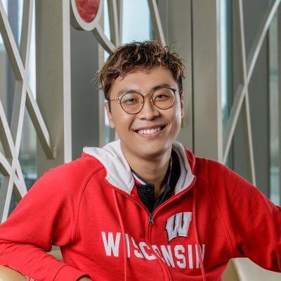 Portrait of Leo Kin-chong Chao in a red Badger jacket.