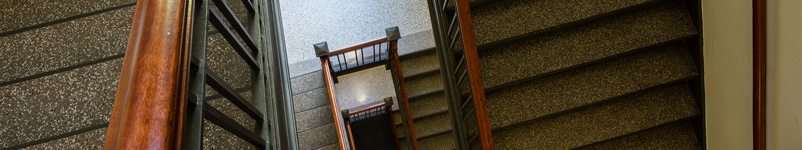 Looking down several flights of winding stairs at Nancy Nicholas Hall.