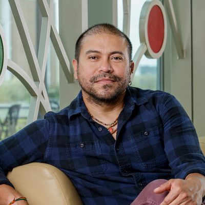 Portrait of Alex Punguil Bravo, a Latino.