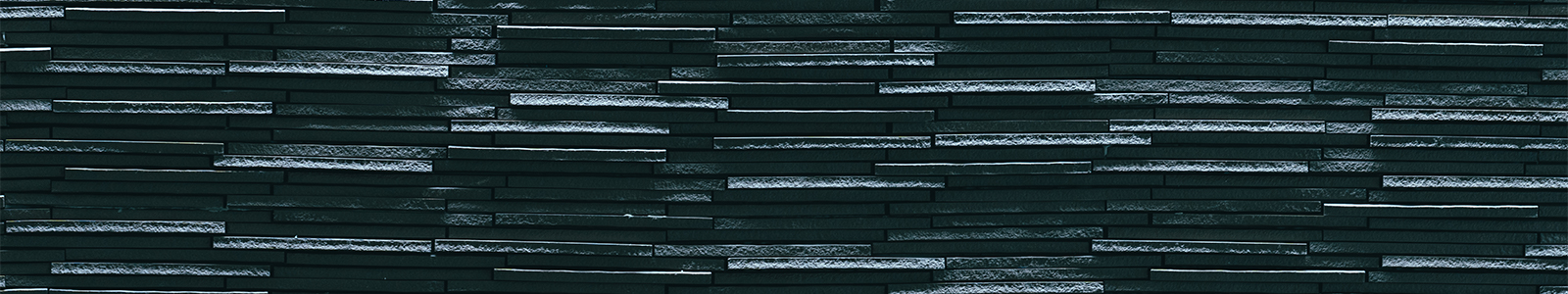 Texture of gray tile on a wall in Nancy Nicholas Hall