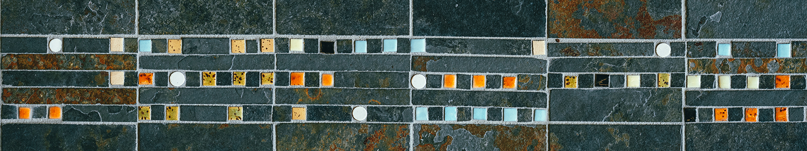 Green, blue, orange, and grey tile from Nancy Nicholas Hall.