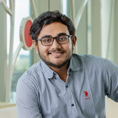 Portrait of Akarshik Banerjee in Nancy Nicholas Hall.
