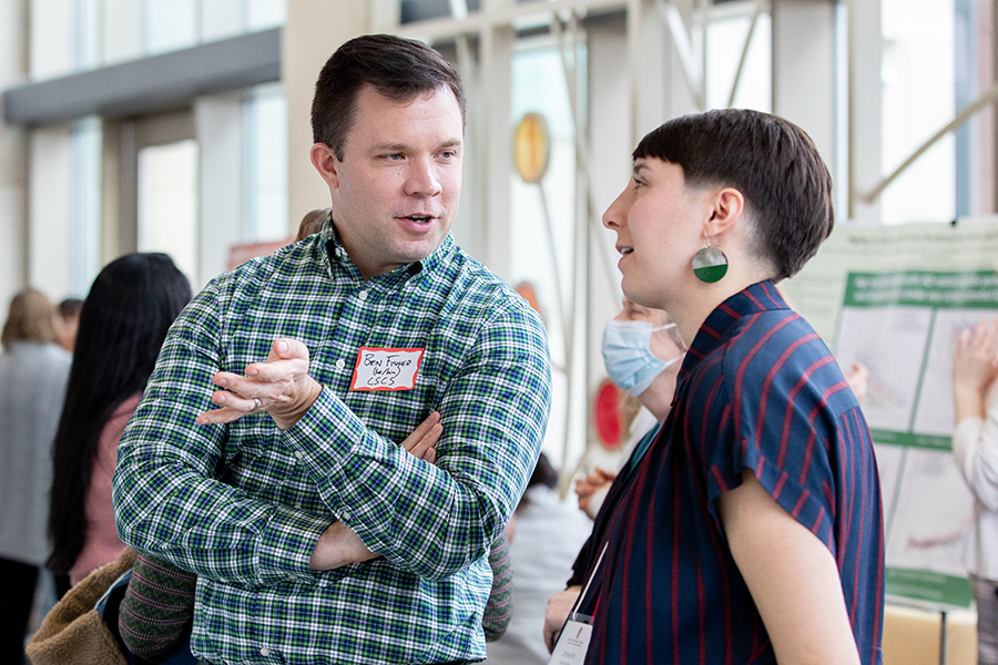 A professor and graduate student in conversation.